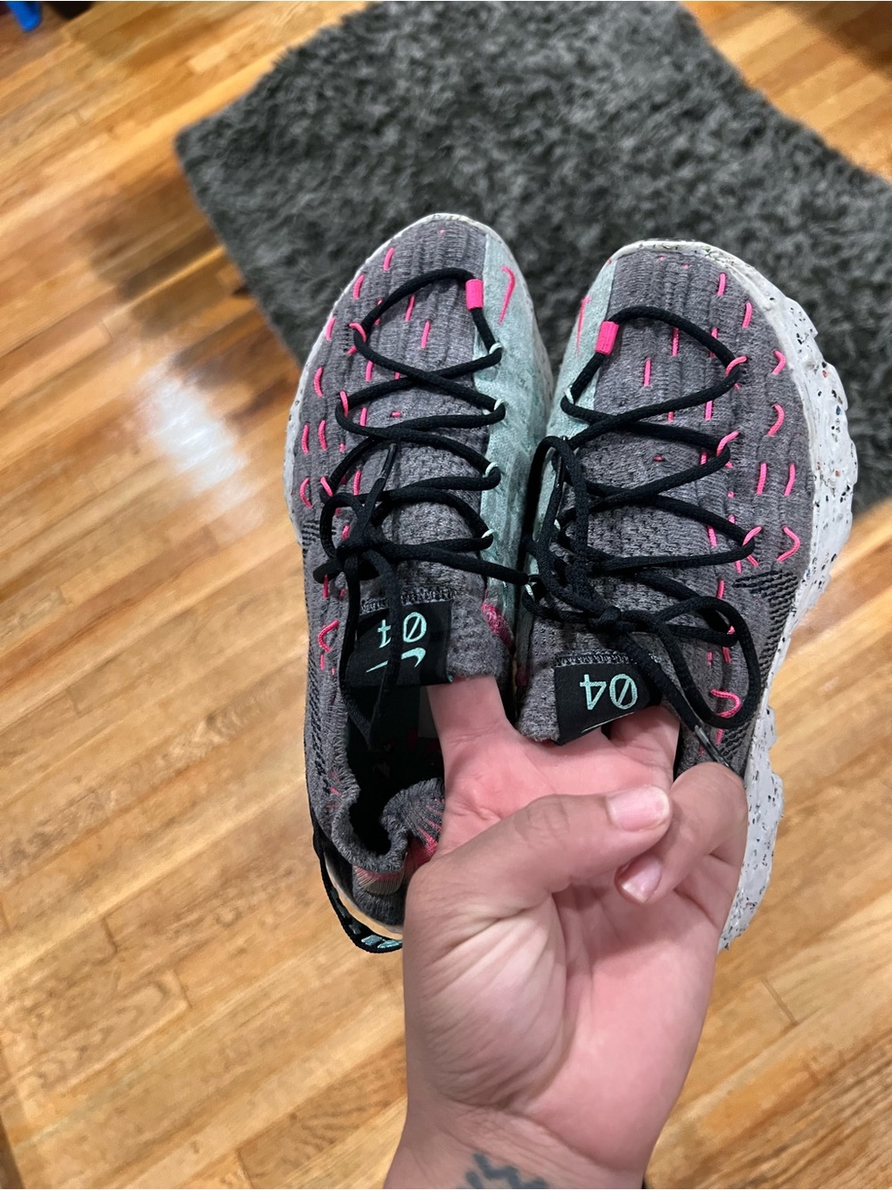 Nike Women's Gray Knit Sneakers with Pink Highlights